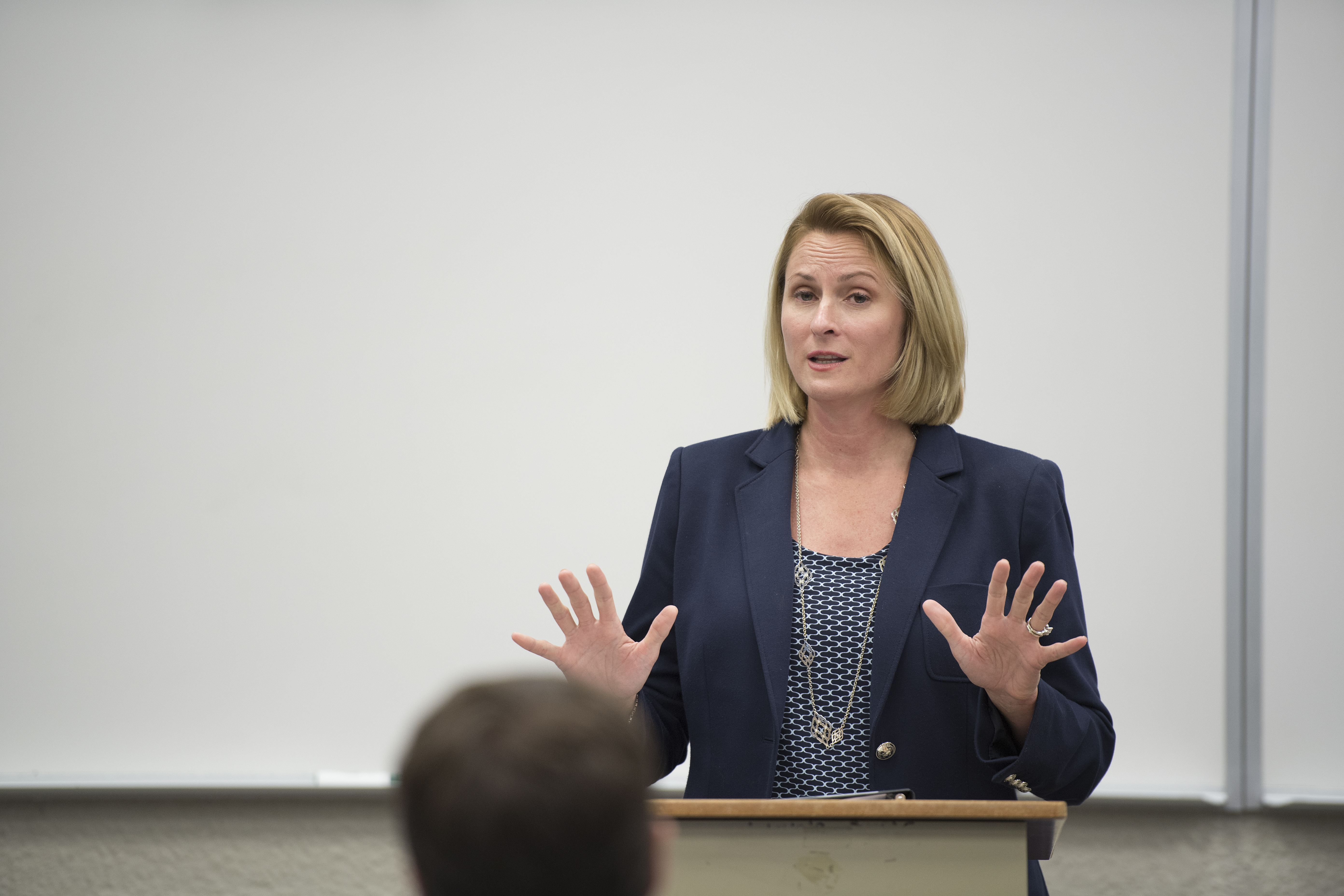 A woman giving a lecture