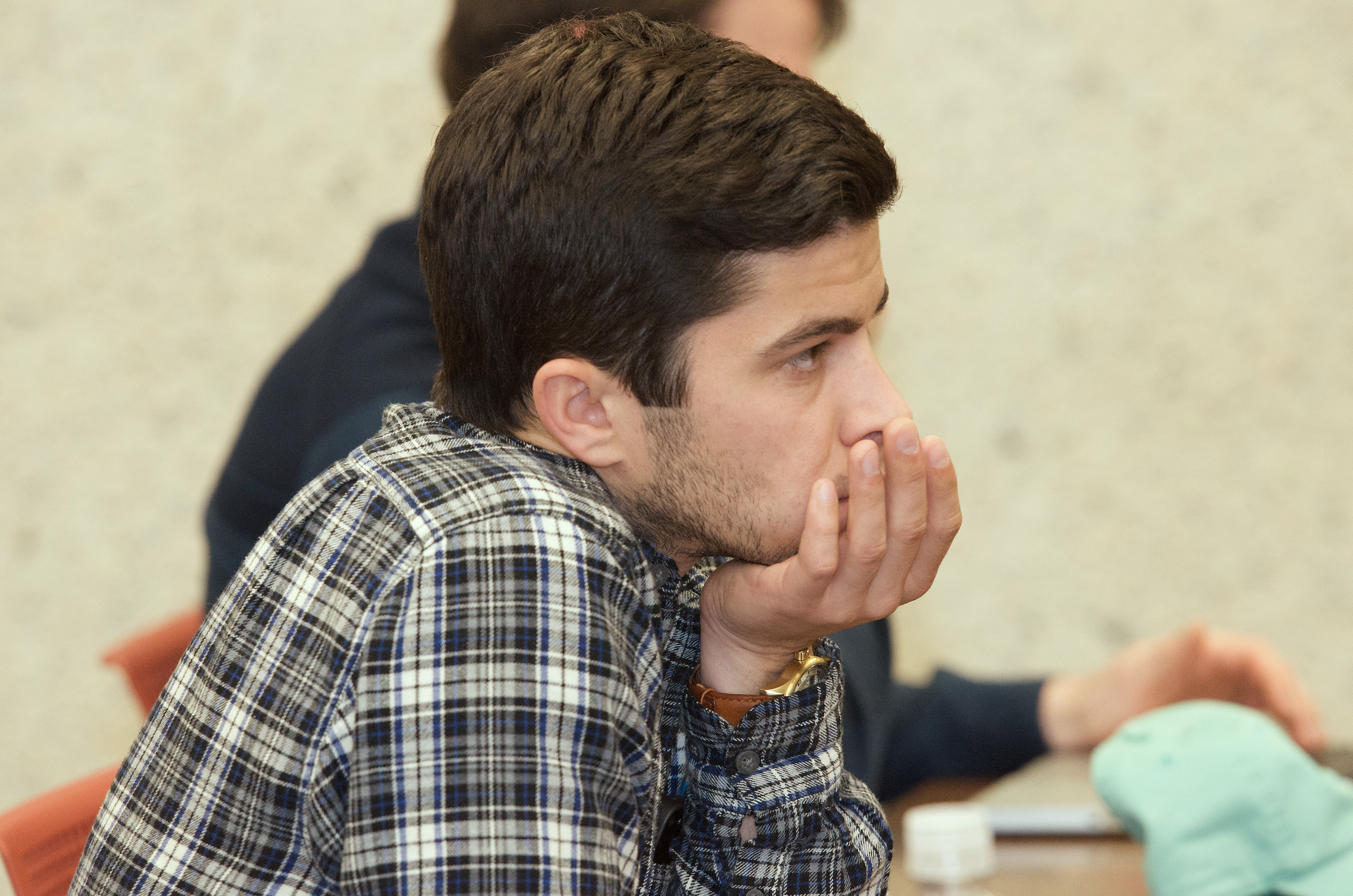 A student listening intently in class